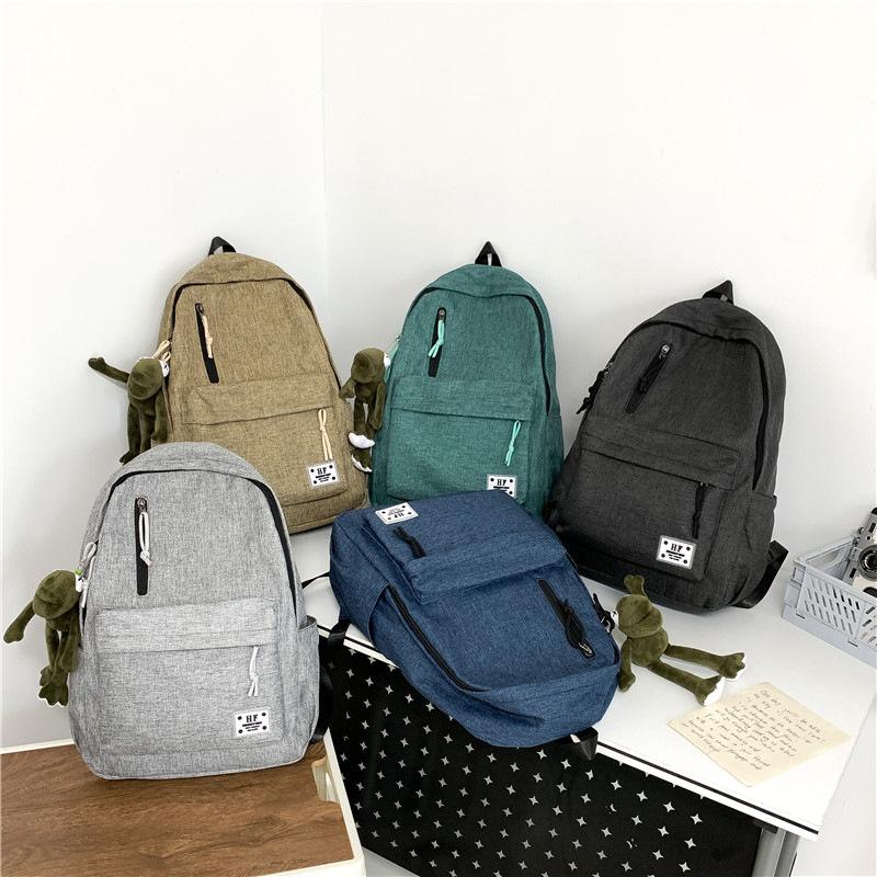 Schoolbag casual schoolbag men's canvas about backpack men's Korean version backpack large capacity middle school student schoolbag computer travel