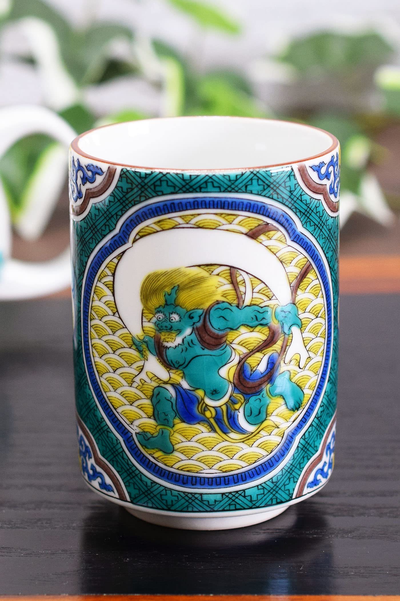 

Waza no Kura: Stylish Kutani Ware Teacup with Wind and Thunder God Designs, Made in Japan