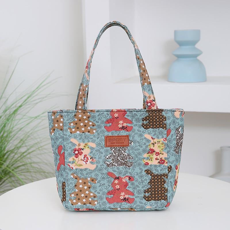 

New canvas women s handbag bento bag printed small cloth bag work handbag large capacity