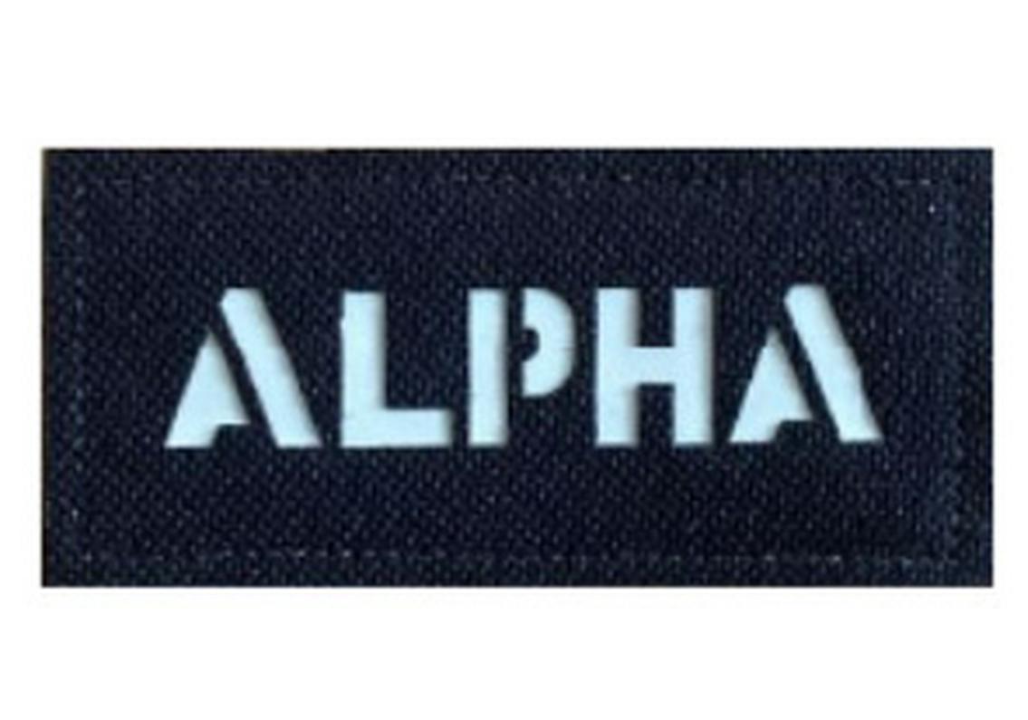 

Red Reflective Velcro Patch for Outdoor Clothing, Hats, and Backpacks