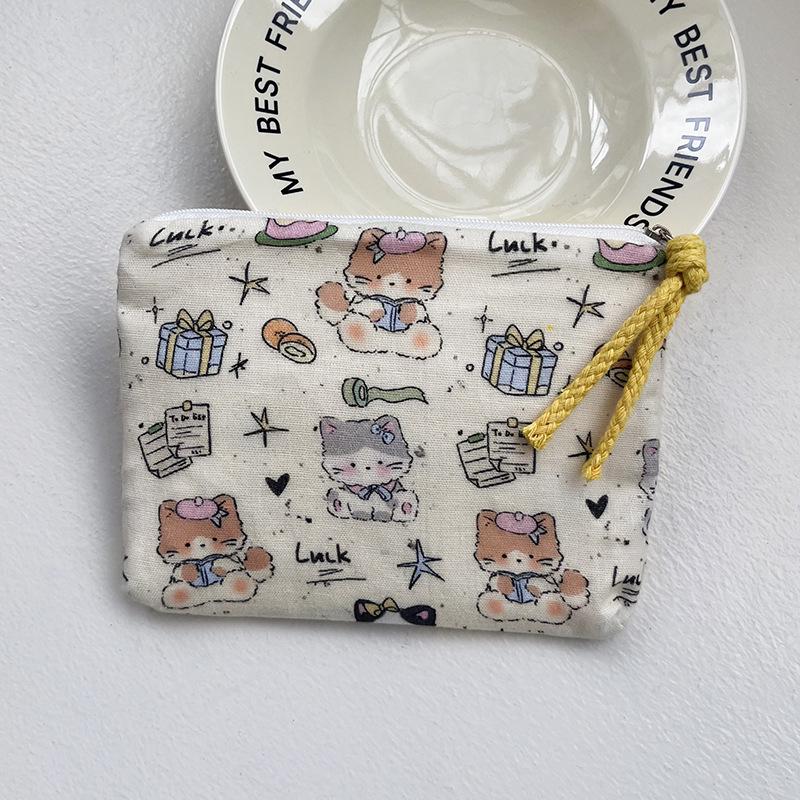 Adorable Blue Cartoon Makeup Bag: Mini Pure Cotton Coin and Earphone Pouch, Lipstick Carrier, Portable Storage.