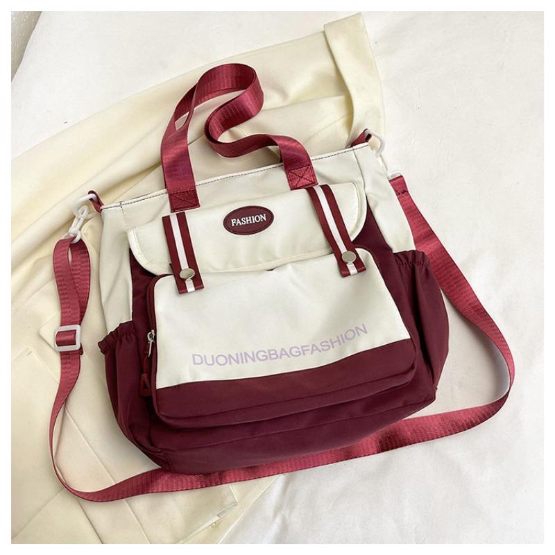 

Lightweight travel bag, nylon waterproof cloth bag, short-haul bag, large-capacity leisure bag, portable oblique span sports women s bag