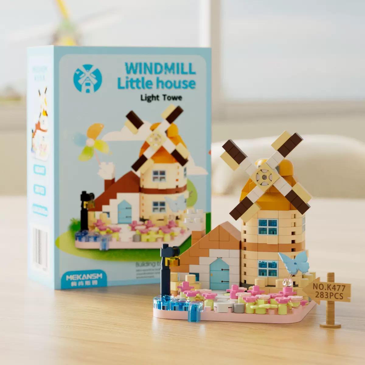 The street scene of the building block windmill house. Forest cabin building blocks. Building block ornaments, educational toys.