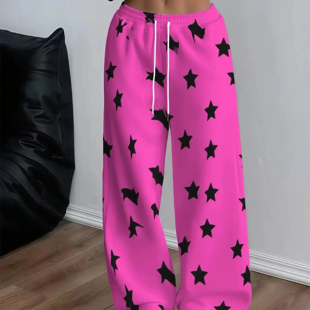 Women's plus size wide leg pants in pink and black with star pattern