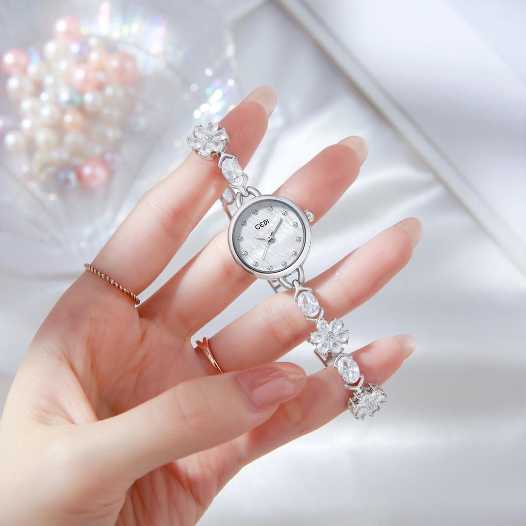 CQ471 Mode Sonnenblumenarmband Damenuhr Leichter Luxusschmuckstil Wasserdichte Quarz-Armbanduhren für Damen