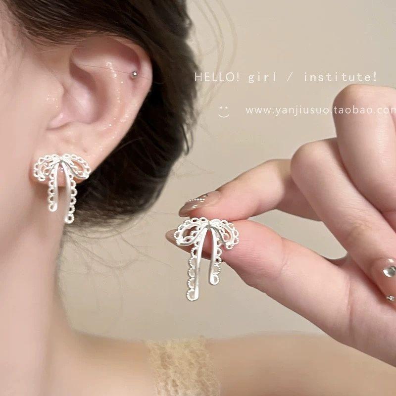 Hollow bow pendant earrings Sweet niche versatile earrings Temperament light luxury high-end earrings