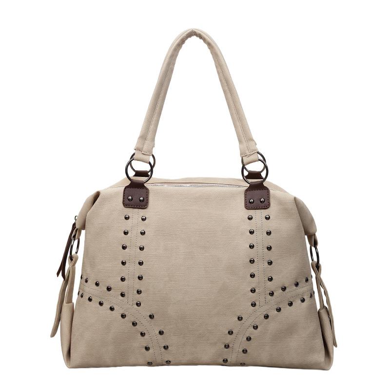 The Large-capacity Rivet Commuter Tote Bag Is A Popular, Casual and Versatile Single-shoulder Underarm Women's Bag