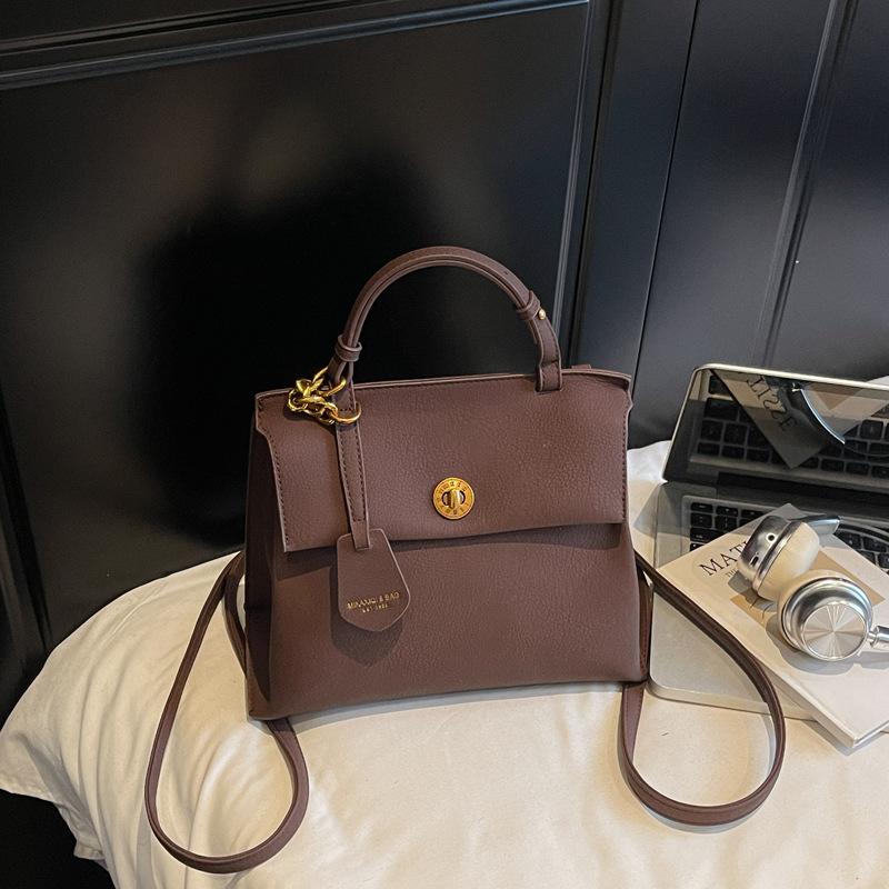 

Niche design bag women s 2025 autumn new large-capacity retro backpack women s handbag Korean version of commuting темно-коричневого