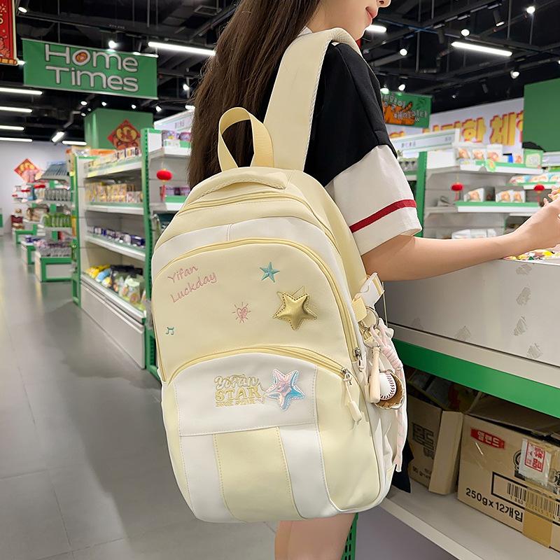 Campus schoolbag female niche design baseball cap backpack junior high school students large capacity commuting light leisure backpack