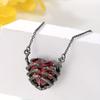Gothic Heart-Shaped Red Synthetic Zircon Necklace with Zombie Claw Design, Funky Style, Plated Zinc Alloy, Unisex Pendant