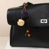 Miu series retro color fringed ball bag pendant doll pendant hand bag fringed pendant casual versatile match