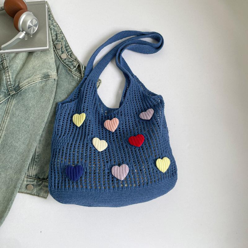 

Large-capacity commuting high-value flower tote bag women s 2025 new summer hollow knitted bag shoulder woven bag темно-синий