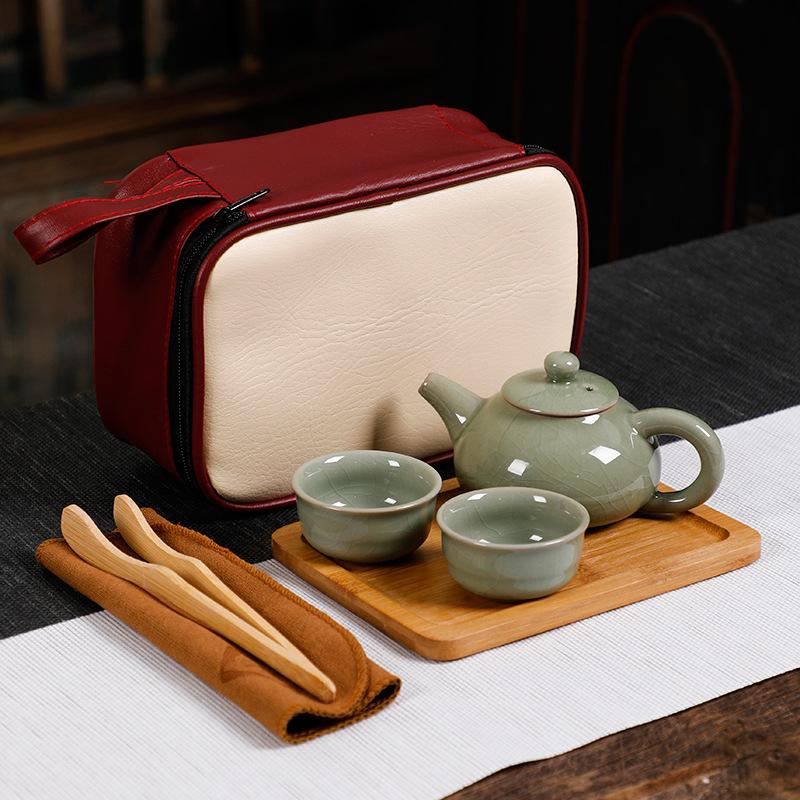 

Travel tea set Portable four cups white porcelain Kuaike cup Outdoor car ceramic Kung Fu tea set Complete household