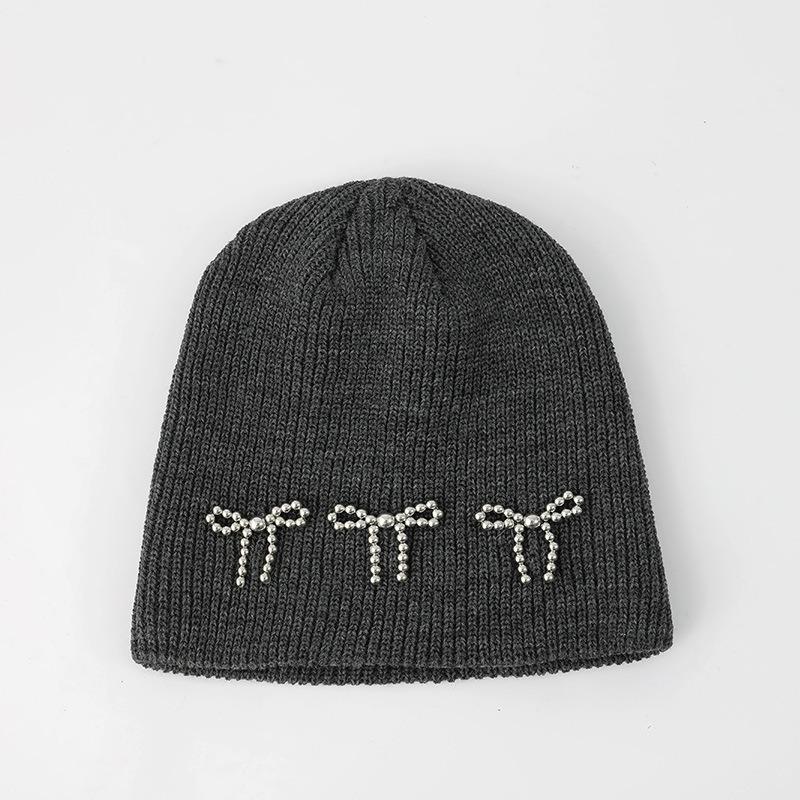 Blogger Pearl Bow Knitted Hat Women's Winter Solid Color Cold-proof and Warm Double-layer Ear Protector Wool Hat