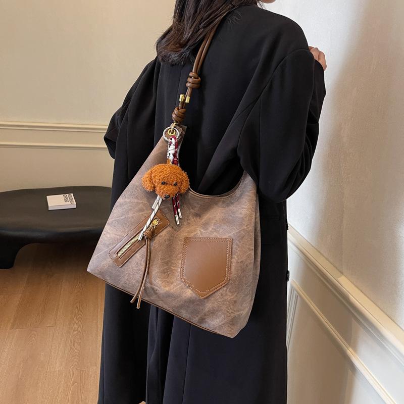 

Женская сумка-тоут, нишевая сумка подмышку высокого класса, новинка 2025 года, ретро, универсальная, большой вместимости, для通勤, на плечо, мессенджер 34*11*34 темно-коричневого