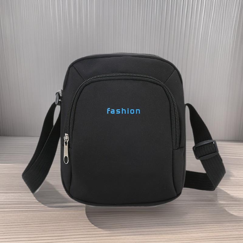 

Men s Portable Crossbody Bag - Lightweight, Trendy Shoulder Messenger for Sports, Casual, or Phone Use. Black with Orange Text