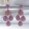 Raffia Water Drop Tassel Earrings - High-End European and American Style for Women