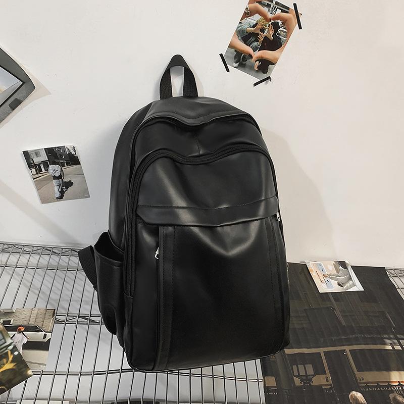

New schoolbag female college student design sense niche fashion backpack male simple large capacity backpack чорний