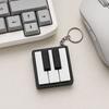 Yousheng Mini Piano Nøkkelring, Pianotast Klikker, Spillbart Fingertupp Piano Stresslindrende Leketøy med Metallring, Klassiske Svarte og Hvite Taster for Musikkelskere