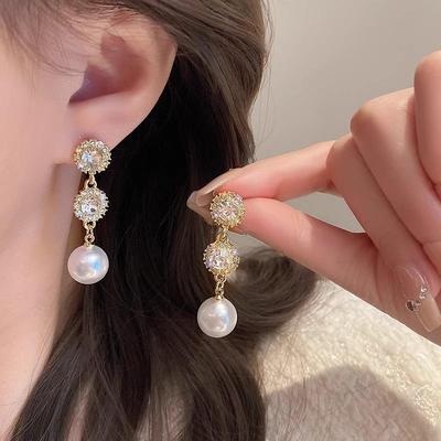 Elegant High-End Pearl Earrings for Women - Stylish, Versatile, and Exquisite Fashion Accessory.