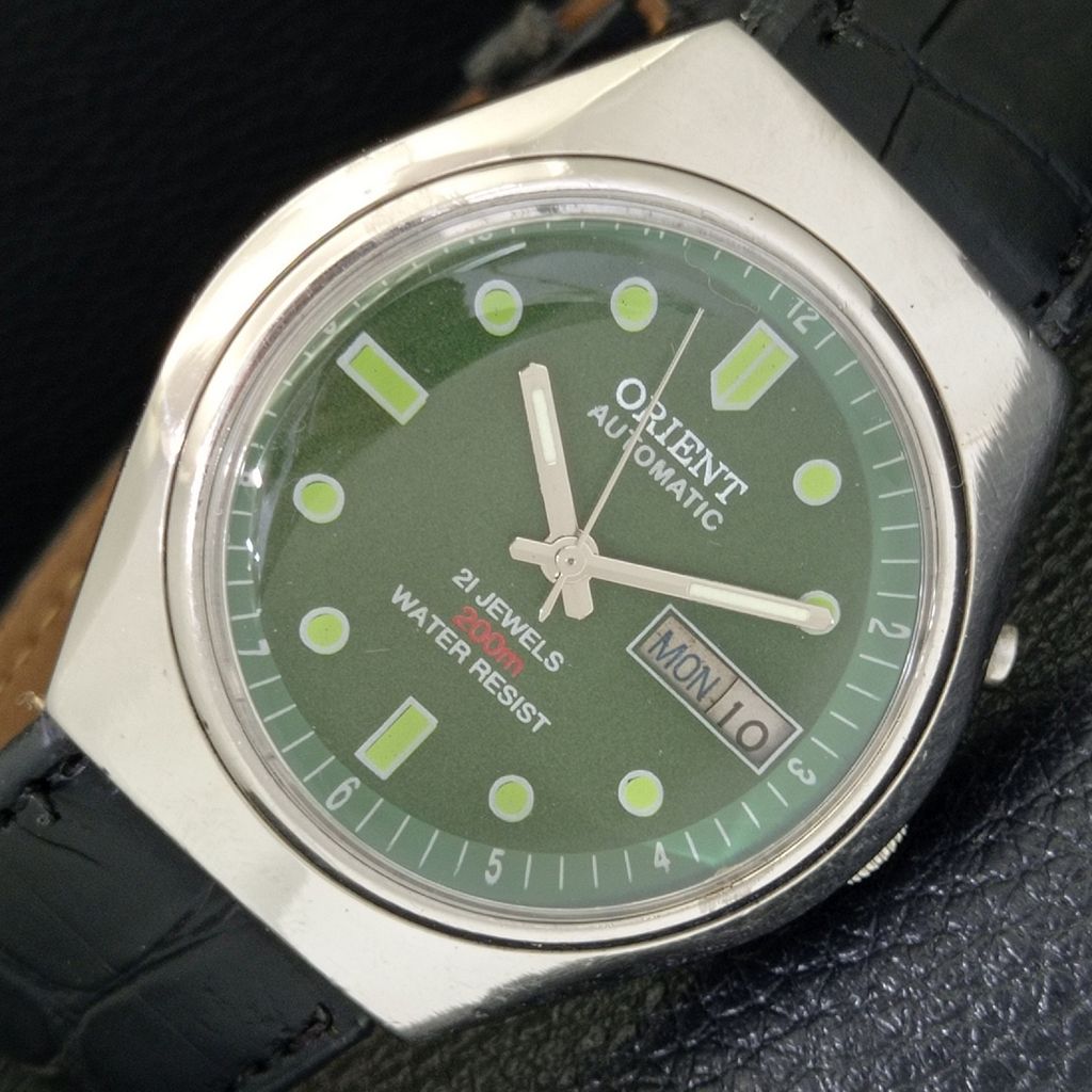 

VINTAGE ORIENT AUTOMATIC JAPAN MENS GREEN COLOR DIAL WATCH a700704-5 R204-a700704