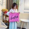 Large Capacity Canvas Tote Bag with Denim Fabric and Tassel Design for Commuting