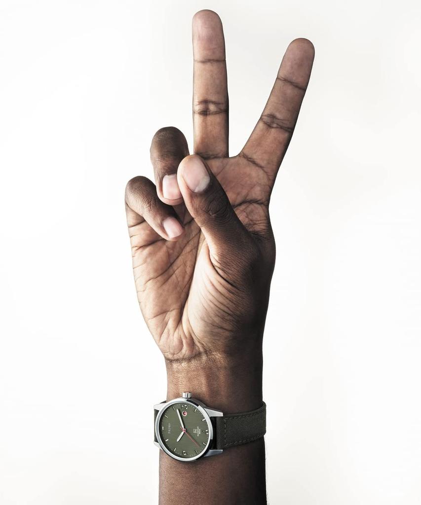 Orologio TRIWA TIME FOR PEACE HUMANIUM 39 in metallo verde Humanium Time for Peace HU39GR-CL080912 da uomo [Importazione normale]