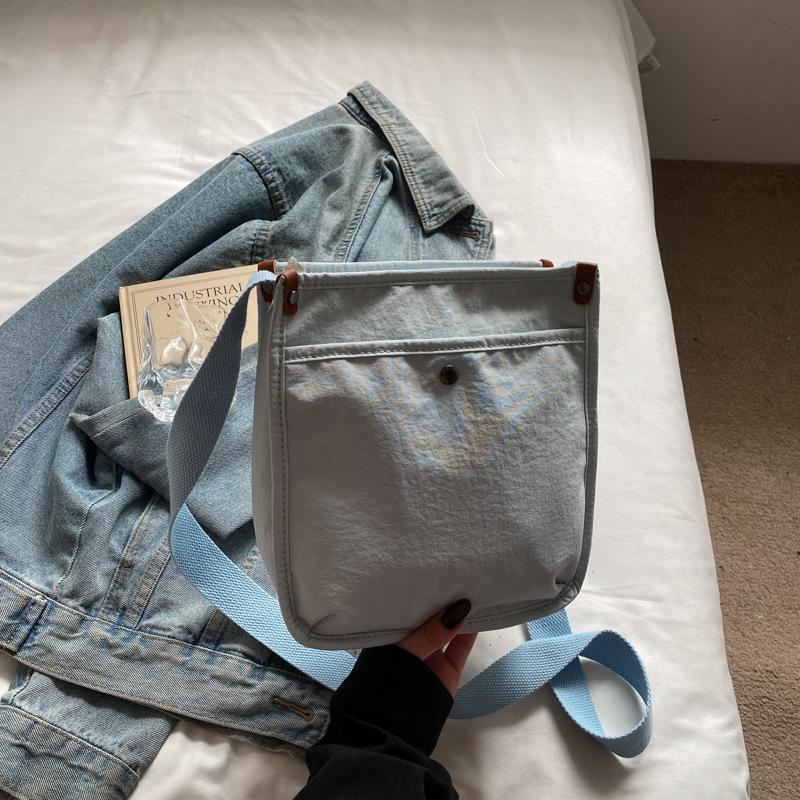 Canvas bag women's large capacity 2025 summer new simple shoulder messenger bag casual fashion trend tote bag