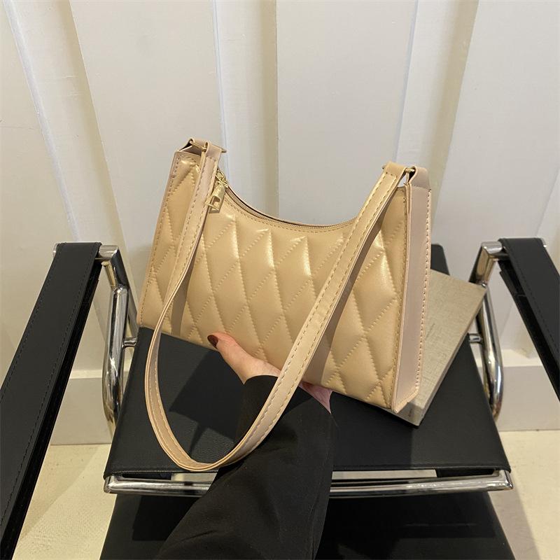 

Темпераментна сумка під пахву з ромбоподібною вишивкою жіноча 2024 літо нова в іноземному стилі жіноча однотонна на плече корейська версія повсякденна сумка хакі