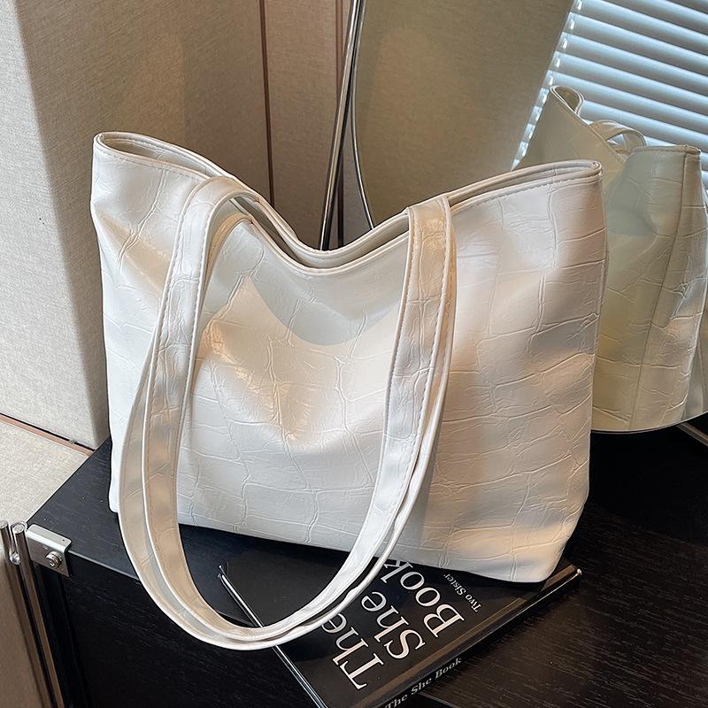 Korean Version of Fashion Simple Shoulder Bucket Bag Women's 2025 Summer New Large-capacity Stone Pattern Commuter Handbag