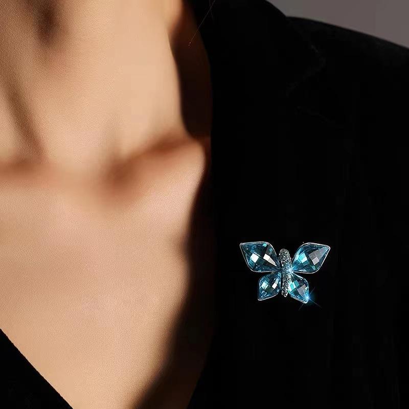 Blue Crystal Butterfly Brooch - An Elegant and Upscale Accessory for Your Clothing and Jewelry Collection.