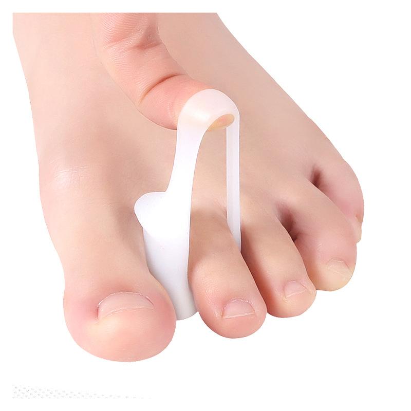 Neuer einzelner SEBS Zehenspreizer mit Loch, Hallux Valgus Überlappende Zehenspreizer, SEBS Zehenspreizer, Zehenschoner Praktisches Design