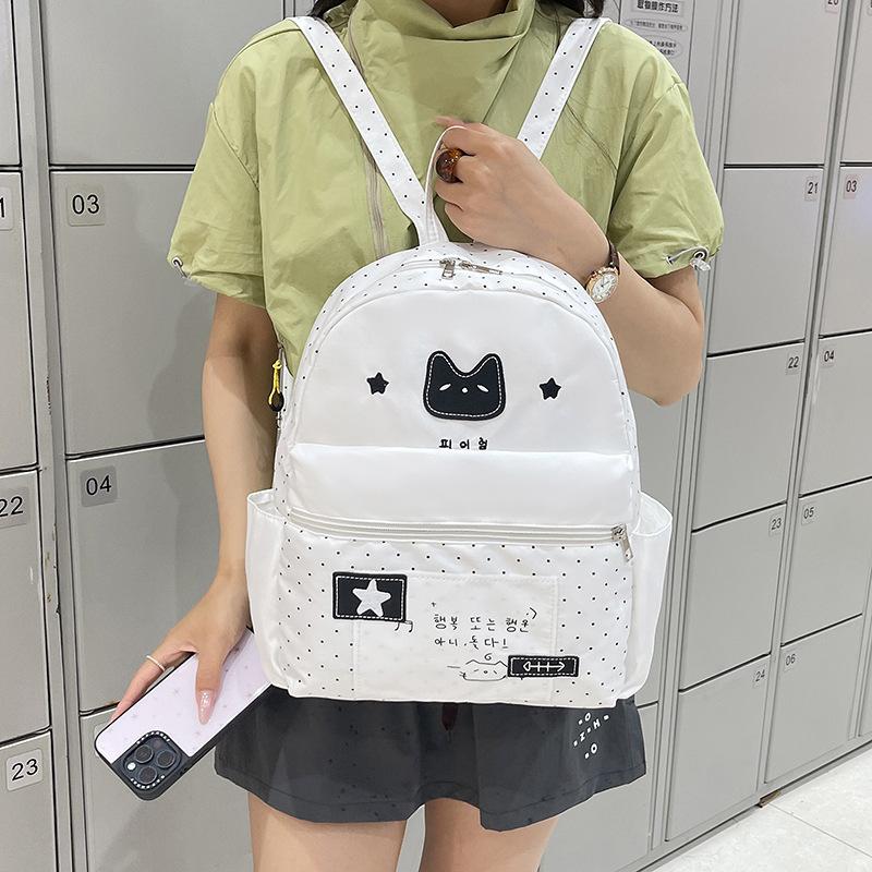 Schoolbag niche non-collision polka dot black cat schoolbag female Korean girl large capacity portable backpack student leisure bag