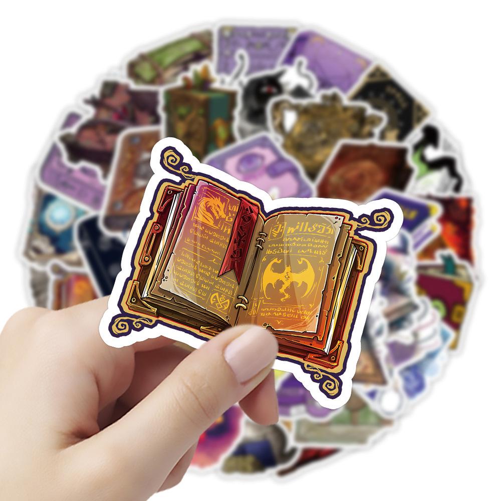 10/50ks Cartoon Grimoire kouzelná kniha Samolepky Magická kniha čarodějnice graffiti samolepky pro kutily zavazadla Laptop Bicycle Sticker