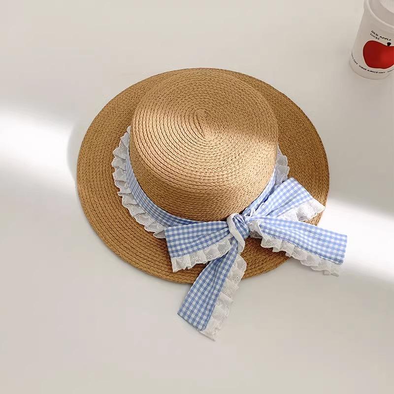 Korean Version Spring and Summer Flat Top Top Top Hat Seaside Travel Vacation Sun Protection Beach Hat Bow Strap Straw Hat