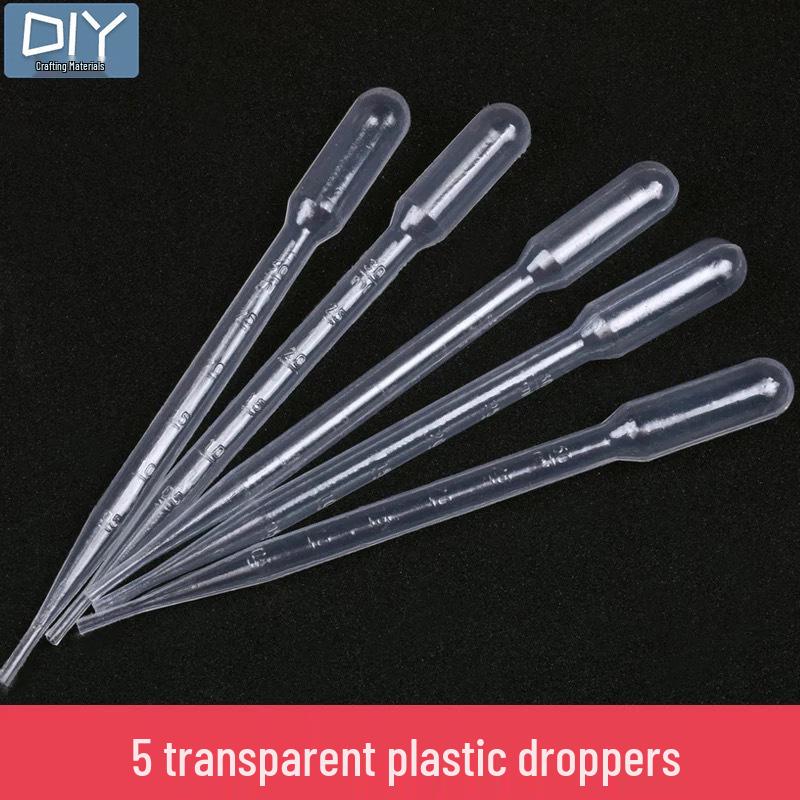 DIY Epoxid-Werkzeugset mit Handschuhen, Messbechern, Waage, Pinzetten, Tropfer, Schleifpapier, Politur und Stanze.