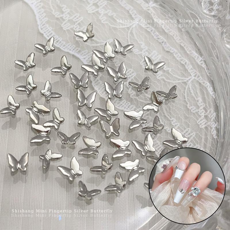 50 Pièces Mini Accessoires pour Ongles Papillon Alliage d'Argent Diamant Métal Charms Papillon Diamant 3D pour le Bout des Doigts Décorations