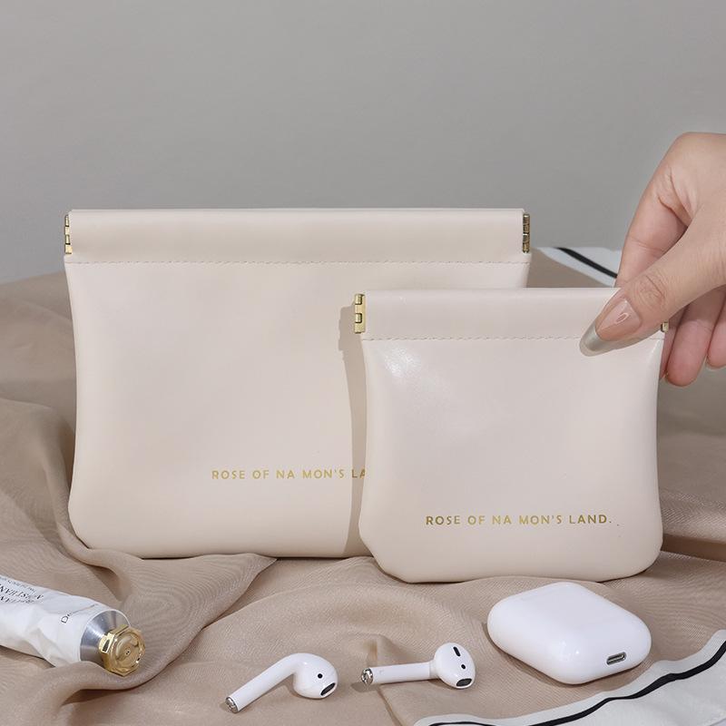 Multi-Use Portable Mini Bag: Coin Purse, Key Holder, Makeup Bag, Data Cable Storage, and Carry-On Organizer