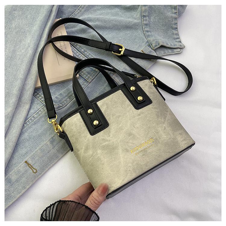 Nischen-Retro-Tasche Damen neue Frühling und Sommer vielseitige Umhängetasche exquisite tragbare Bucket Bag