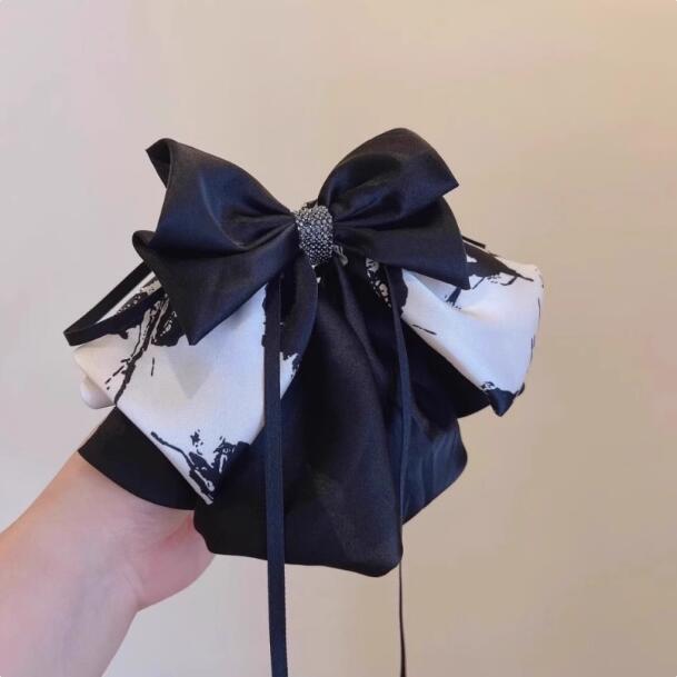 

Korean version of fashion polka dot bow high ponytail clip women s high-end flash diamond back head headdress hair accessories
