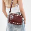 2025 new hot-selling personalized polka dot rivet camera bag niche design simple trend high-end textured messenger bag