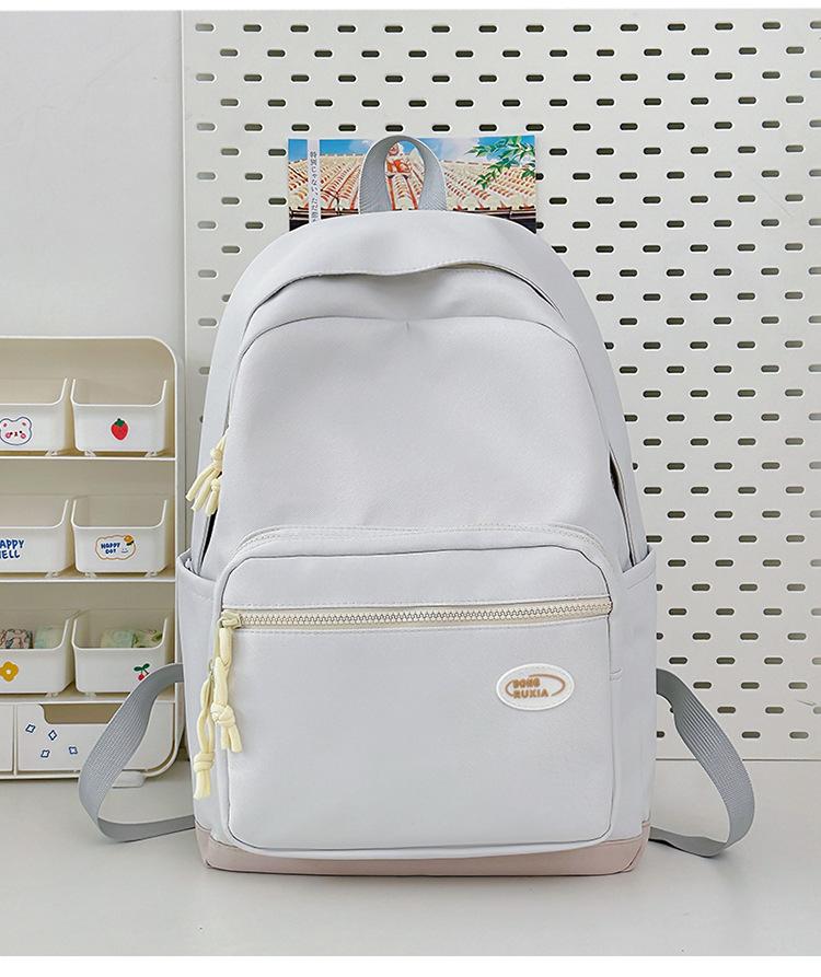 

Backpack Junior high school student large-capacity campus leisure school bag nylon outdoor simple sports travel backpack computer bag