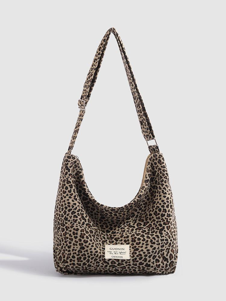 

Large-capacity commuter tote bag women s 2025 new Korean version leopard print canvas bag casual simple shoulder messenger bag цветной печати леопарда