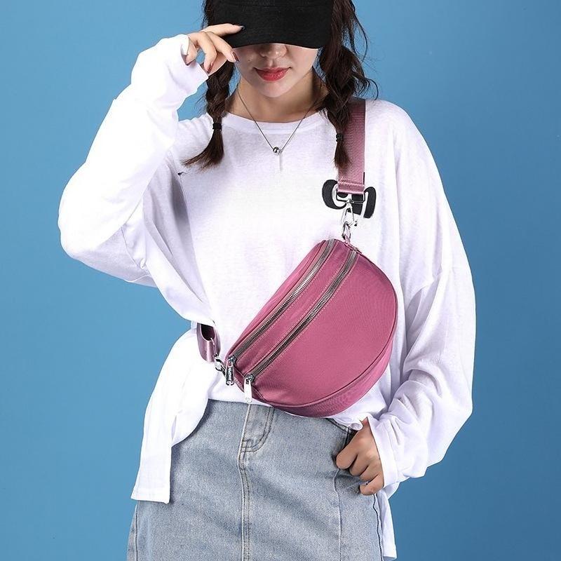 Eine trendige Pendler-Damen-Einzelschultertasche, frische und einfache Umhängetasche, Handy- und Münzfach