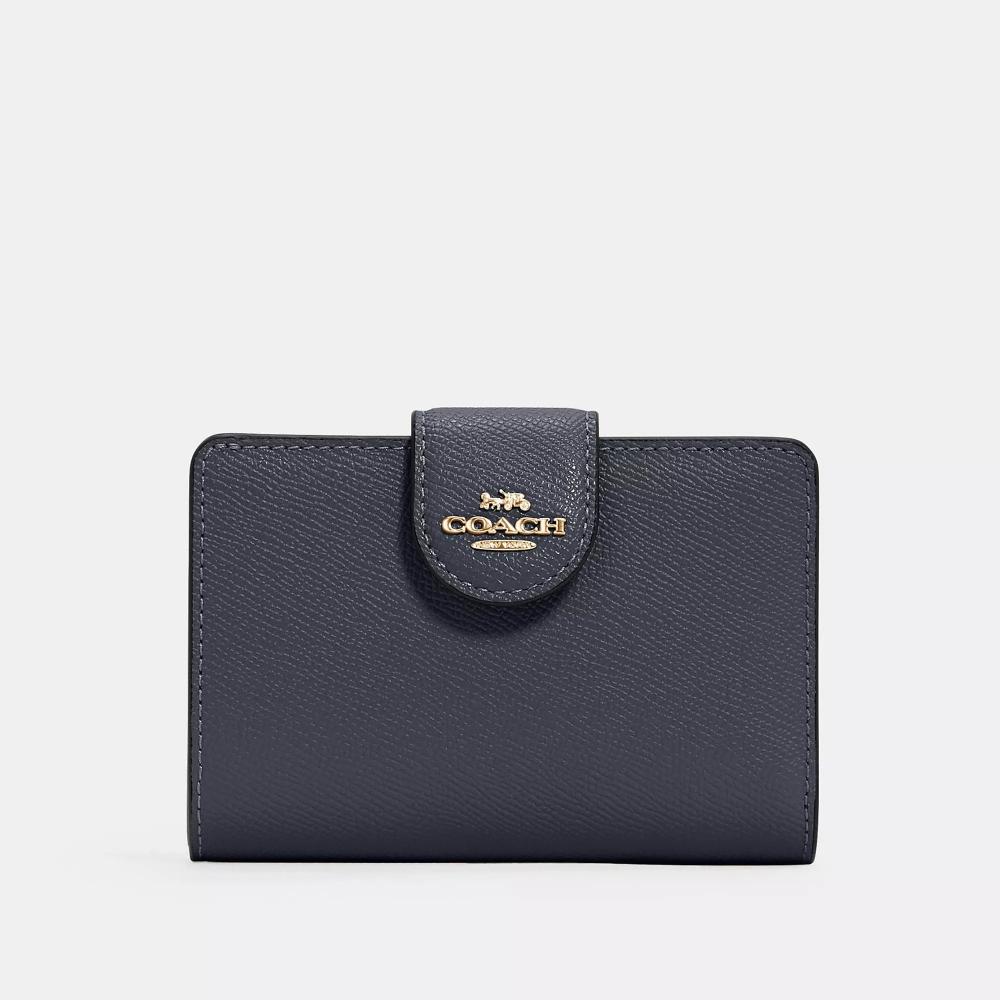 

Угловой кошелек Coach среднего размера на молнии, золотистый полуночь