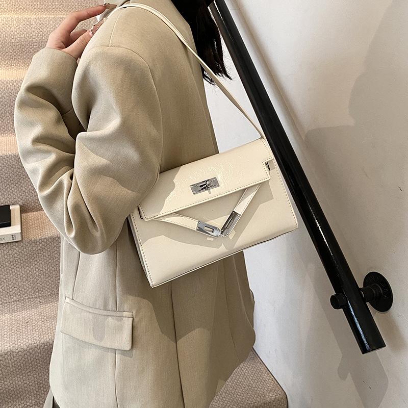 Kelly Bag Damen vielseitige Schulter-Unterarmtasche Premium-Gefühl Herbst und Winter Retro tragbare Baguette-Tasche