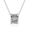 Sparkling Barrel Pendant Necklace with Textured Inlay and Central Ring Detail Modern Elegant Jewelry for Women