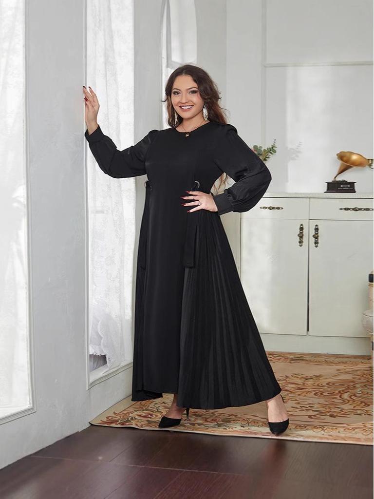 Elegantes Damenkleid im Nahen Osten mit Laternenärmeln und Schnürung in der Taille