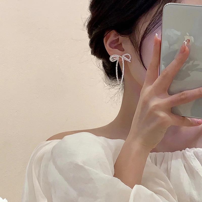 Witte Strik Imitatie Parels Kwastje Hangende Oorbellen voor Vrouwen Temperament Veelzijdige Mode Oorbel Elegante Sieraden Groothandel