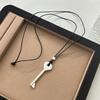 Elegant Metal Key Charm Black Rope Necklace Stylish Layering Pieces For Everyday Wear